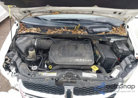 2013 Dodge Grand Caravan Crew z USA, uszkodzony, nr VIN 2C4RDGDG5DR502526